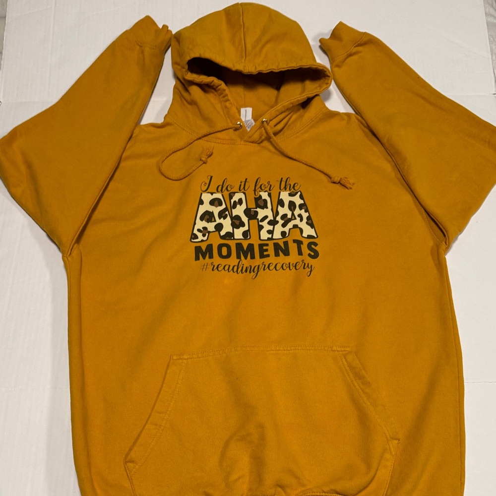 Mustard Yellow Graphic Hoodie with Leopard Print Accents. Nice thick hoodie.